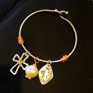 Silver and gold toned Cross bracelet